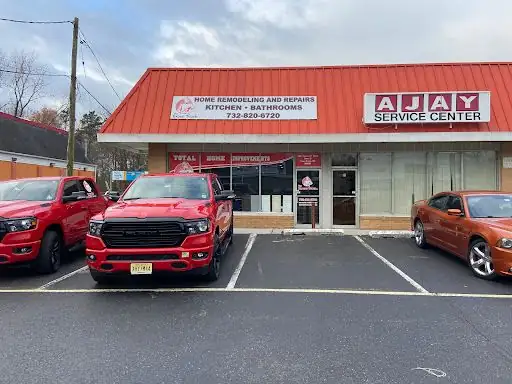 The Expert Touch storefront on Route 37 in Toms River, with a sign for home remodeling and repairs, kitchens and bathrooms